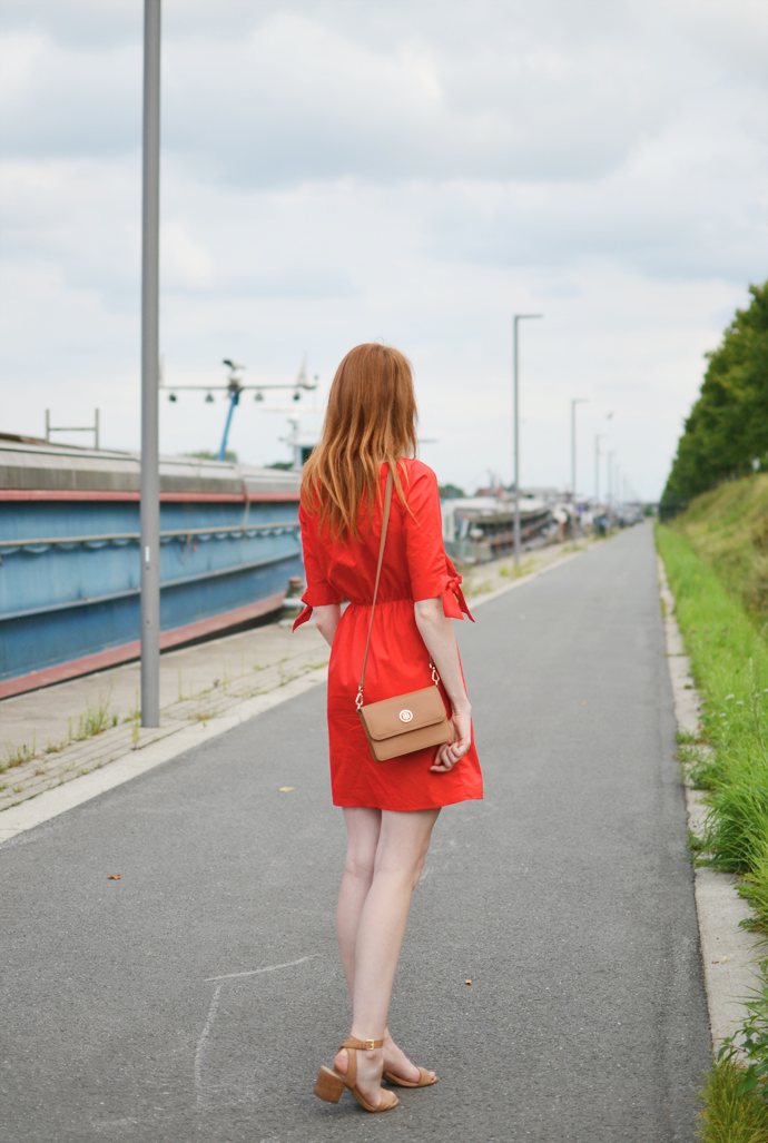 Redhead wearing red