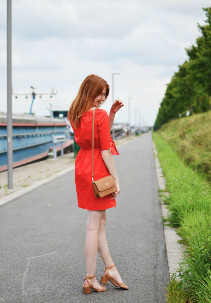 Redhead wearing red