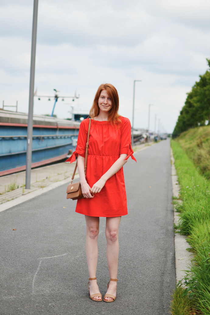Redhead wearing red