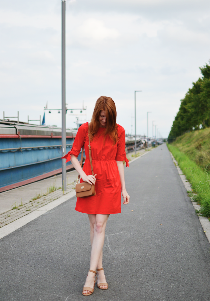 Redhead wearing red