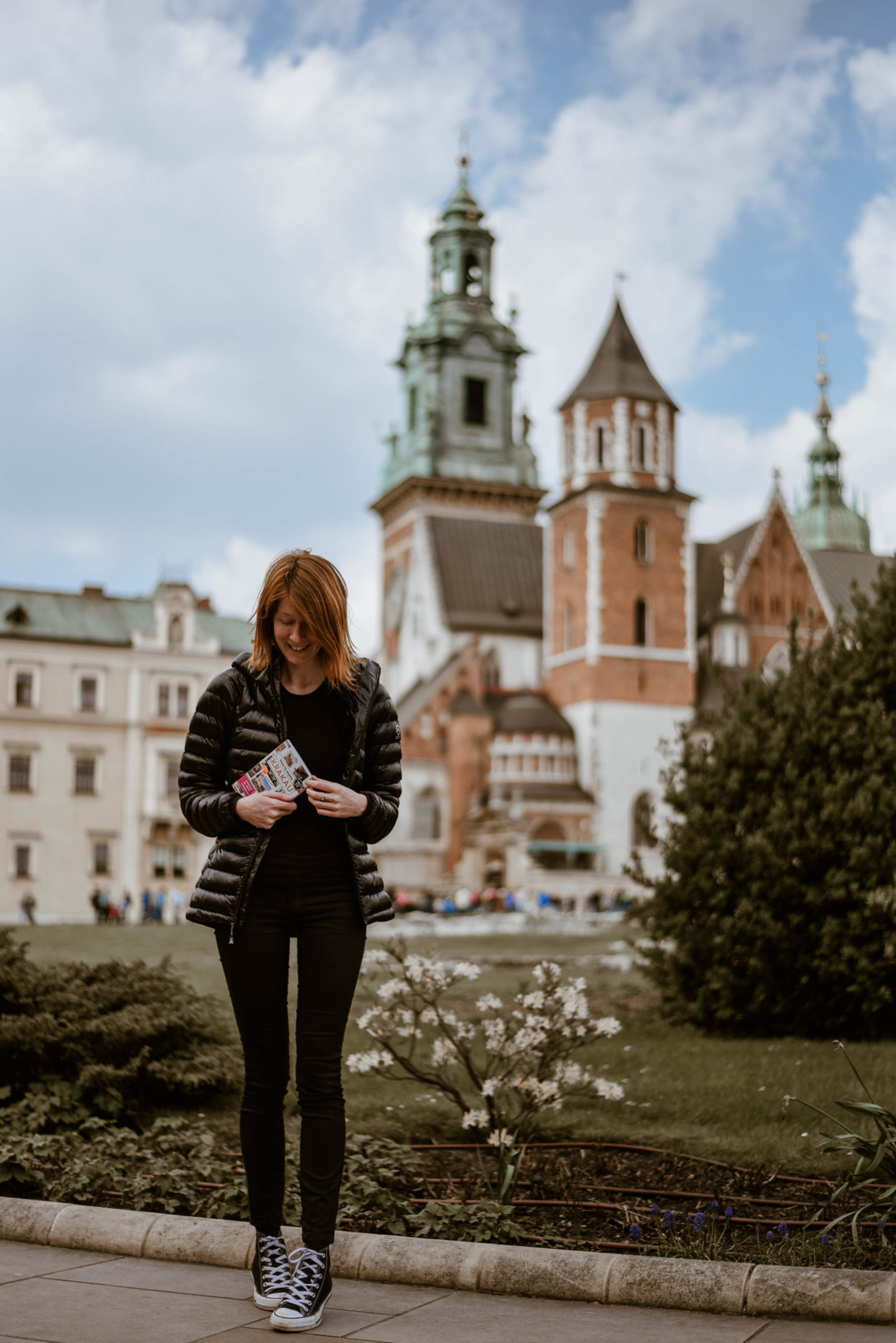 Girl in front of Wawel Royal Palace in Krakow