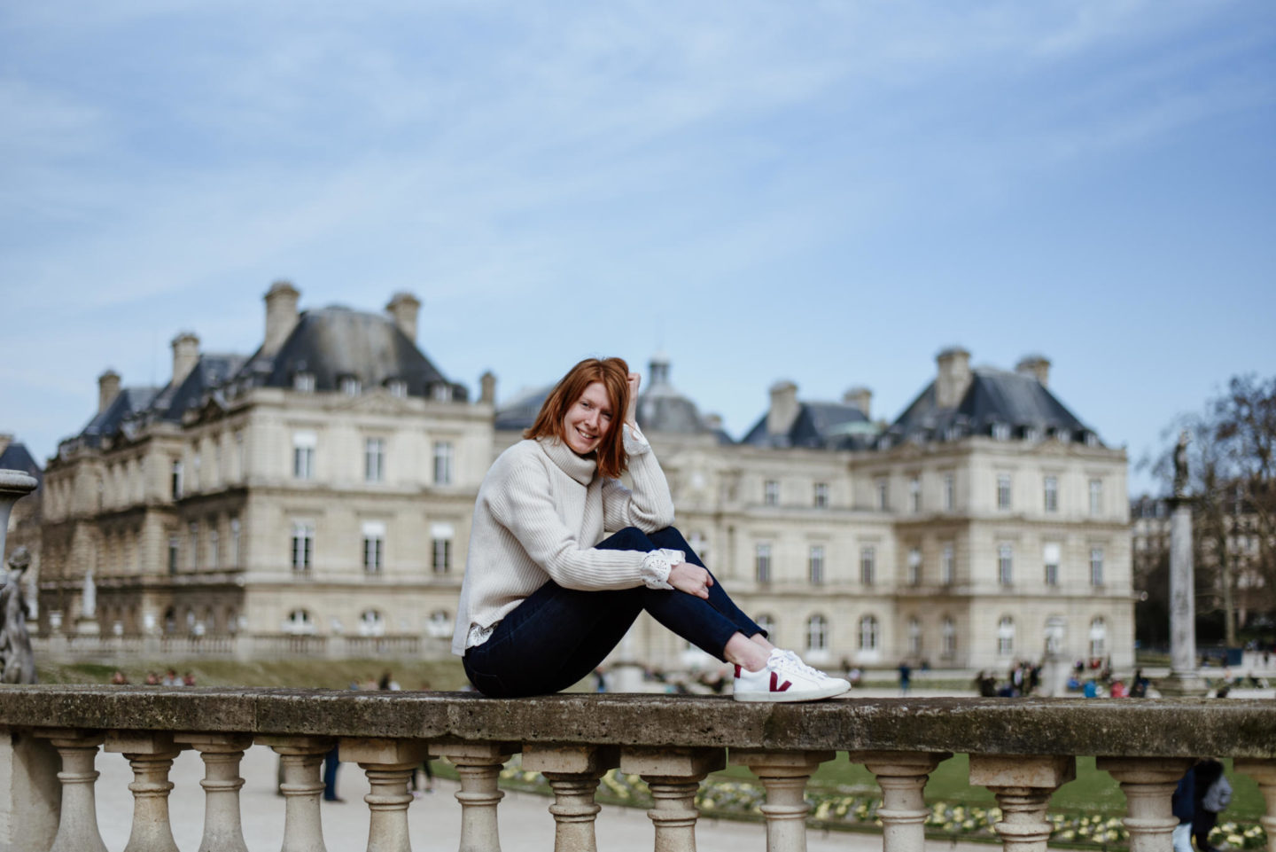 girl in front of castle Jardin De Luxembourg Paris