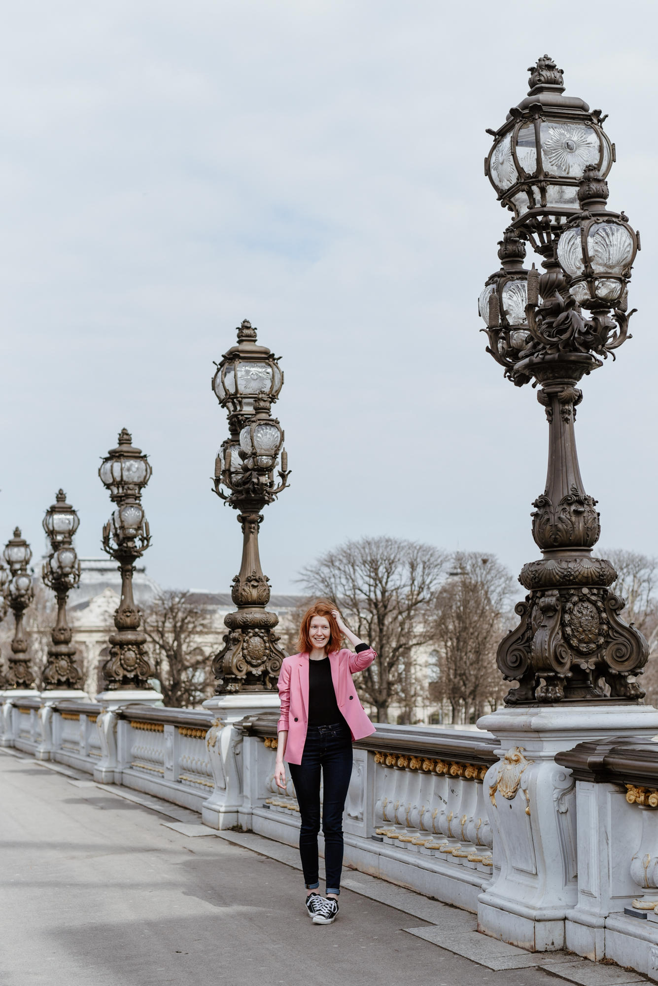 girl on Pont Alexandre III in Paris