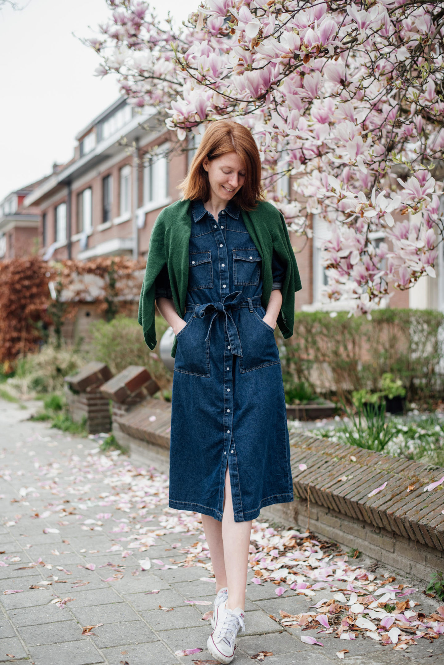 women's outfit with a blue jeans dress